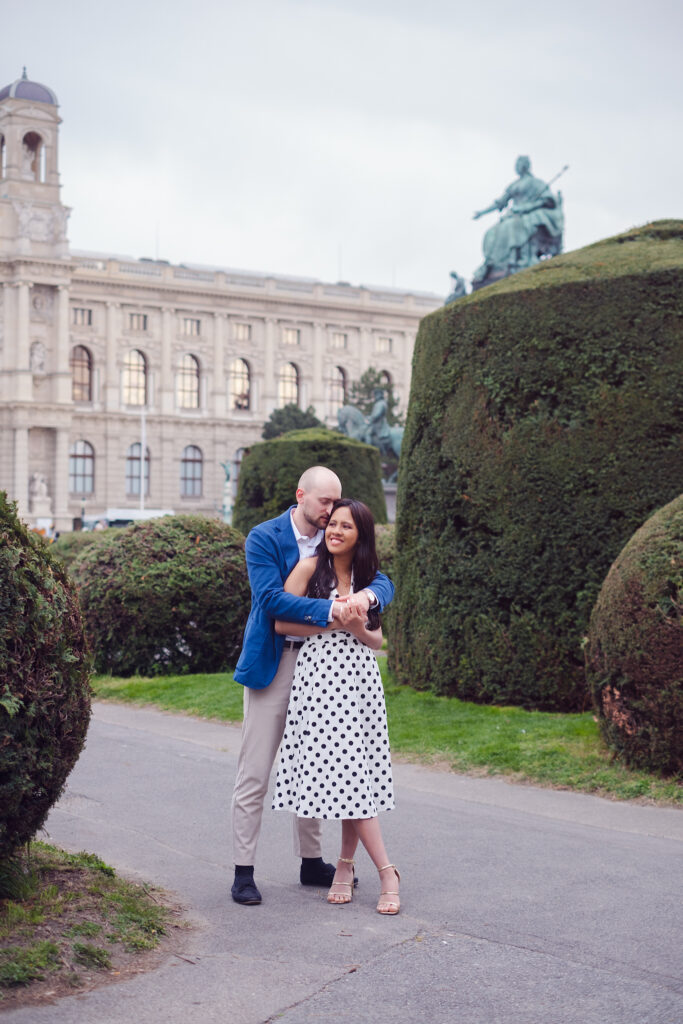 Candid love story photography in front of historic Vienna architecture