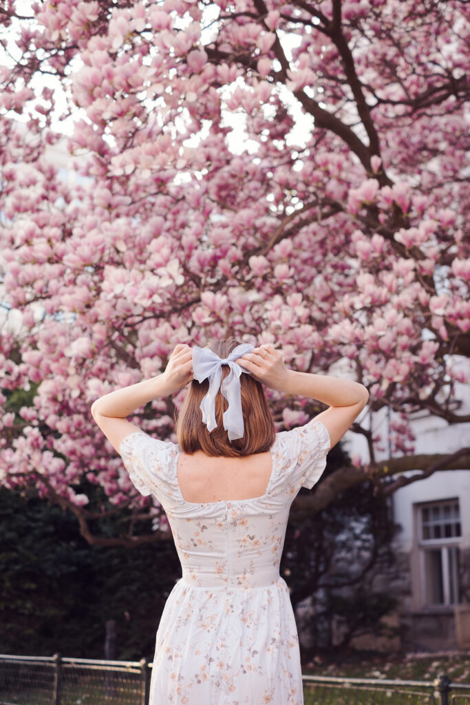 Spring Vienna photoshoot with blossoms and soft romantic colours